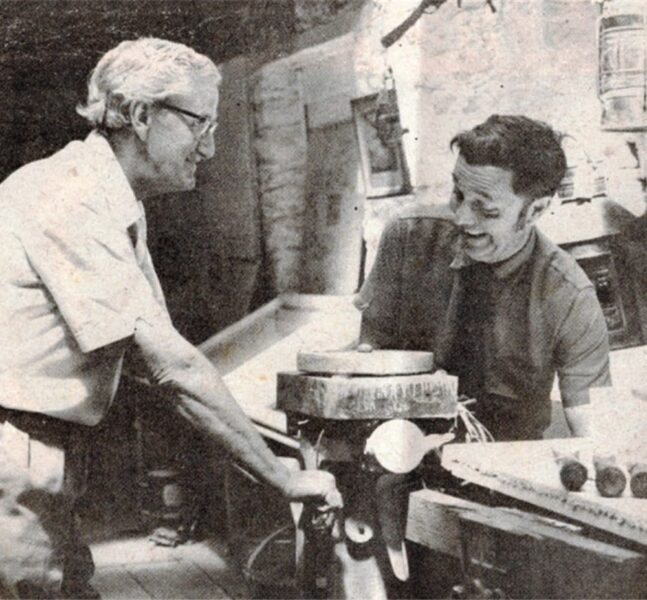Len Fairweather - David Murch setting up the exhibition in Cooks boatstore 1975